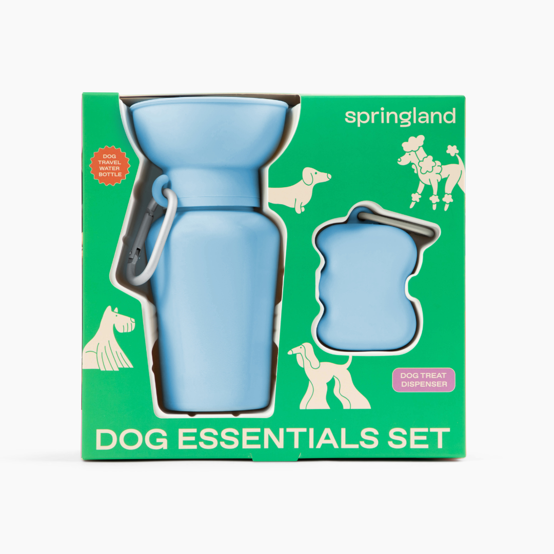 Springland Dog Essentials Set box featuring sky blue water bottle and treat dispenser, front view