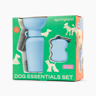 Springland Dog Essentials Set box featuring sky blue water bottle and treat dispenser, opposite side view