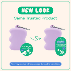 Lilac Springland dog treat dispenser with carabiner clip showing old Springer and new Springland packaging